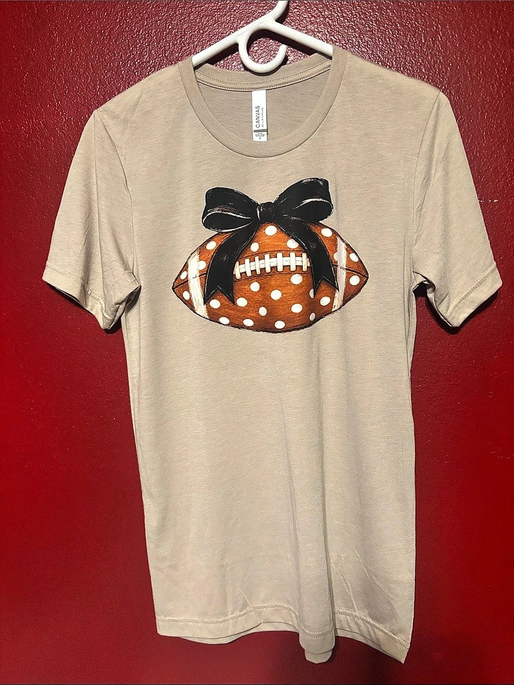 Bella+Canvas 3001 Unisex Staple T-Shirt with Football Bow Graphic 3001 Football